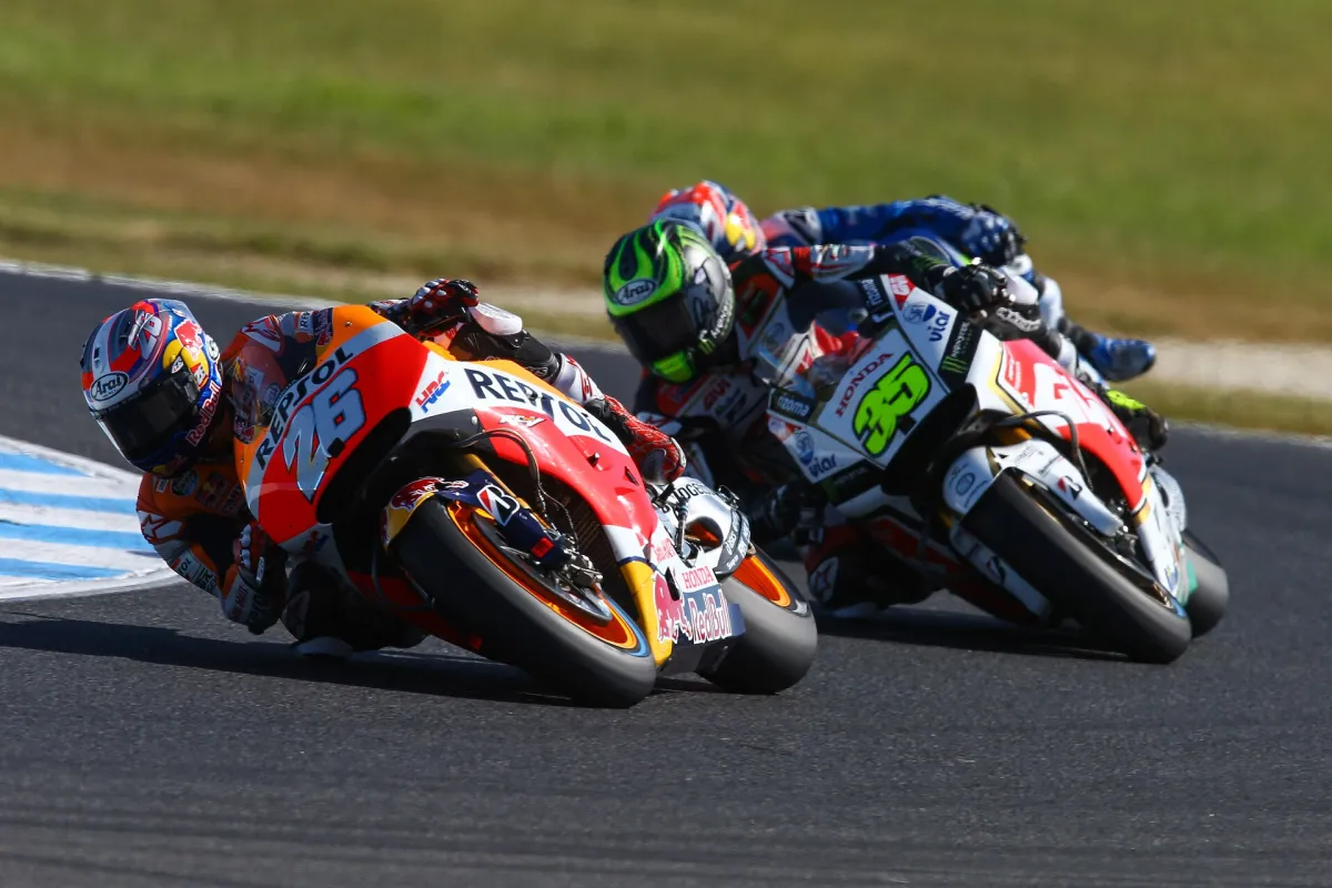 MotoGP riders at full lean